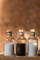 breakfast ingredients in small glass jars - coffee and sugar