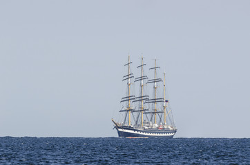 Fototapeta na wymiar SAILING VESSEL - A beautiful black tall ship on the sea