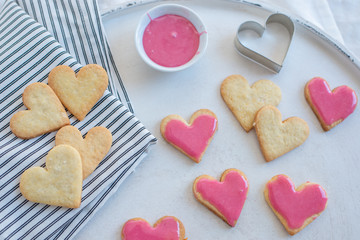 Heart shaped cookies with pink icing
