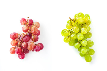 A bunch of red grapes with a bunch of white grapes. Top view, flat lay, creative layout.