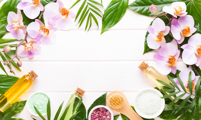 Beauty and fashion concept with spa set on pastel rustic wooden background.