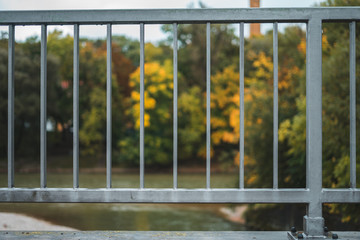 fence in front of trees