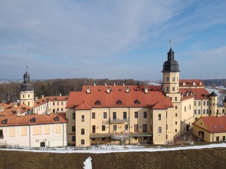 Naklejka na ściany i meble Aerial view of Nesvizh Castle in winter. Minsk Region, Belarus. Site of residential castle of the Radziwill family. 
