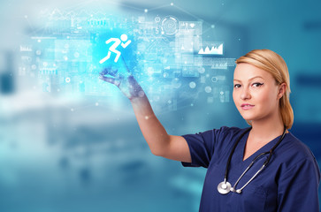 Doctor touching hologram screen displaying healthcare running symbols
