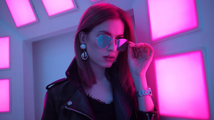 Futuristic style portrait in blue and purple light.