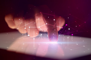 Finger touching tablet with global network concept and dark background

