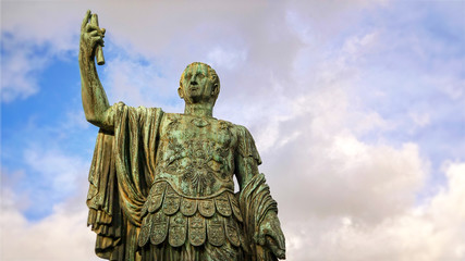 Statue of emperor Julius Caesar along Via dei Fori Imperiali at the Roman Forum in Rome, Italy