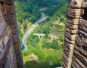 Small stone bridge on the Lot towards Saint-Julien-du-Tournel, Lozere, Occitanie.