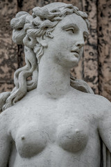 Fototapeta na wymiar Statue of ancient sensual naked Renaissance Era woman in Potsdam, Germany, details, closeup