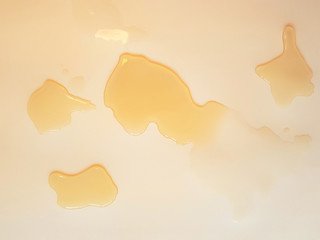 Spill beer on paper background texture