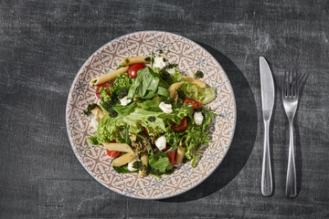Salad - penne pasta with asparagus, tomatoes, quail eggs, mozzarellaand sweet pepper.