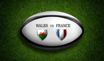 Rugby Match schedule, Wales vs France, flags of countries and rugby ball - 3D rendering