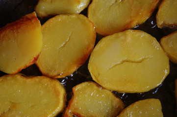 fried potatoes in a pan. 