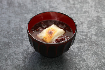 oshiruko, sweet red bean soup with grilled mochi (rice cake), japanese traditional dessert