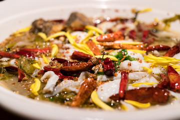 Hot and sour fish with pickled green