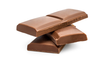 Pieces of chocolate bar on white.