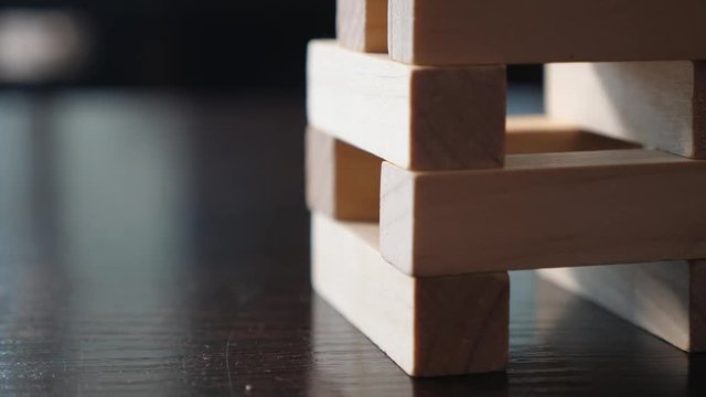 Close up. playing a game of jenga