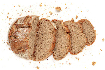 Sliced bread isolated on  white background. Crumbs and fresh Bread slices close up. Bakery, food...