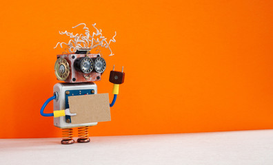 Funny robot with a cardboard card mockup. Creative design robotic toy holding a blank and empty...