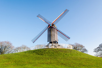 Naklejka premium Windmill on a sunny day, Brugge, West Flanders, Belgium