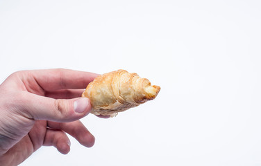 Croissant isolated on white background. Tasty breakfast