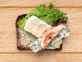 smørrebrød with blue cheese and brie and fig
