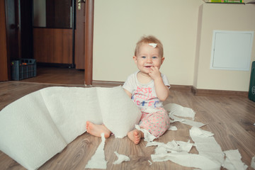 Beautiful expressive adorable happy cute laughing smiling baby infant face showing tongue, isolated.