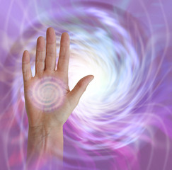 Palm Chakra with Vortex healing energy - female hand facing outwards with a pink spiralling vortex...