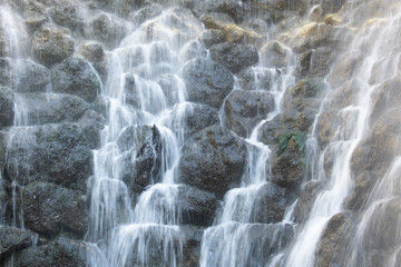 Close up on small waterfall in Xcaret Park, Mexico. Long exposure 