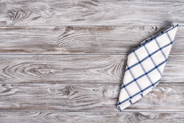 Cooking food or pizza wooden table background with blue and white textile. Copy space for text