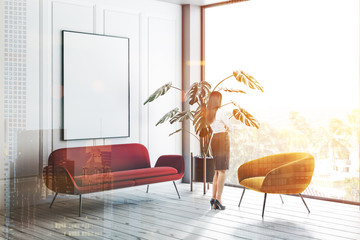 White living room, sofa, poster, armchair, woman