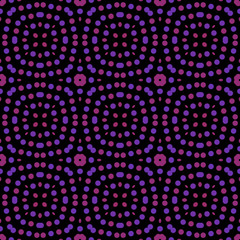 Seamless abstract pattern background with a variety of colored circles.