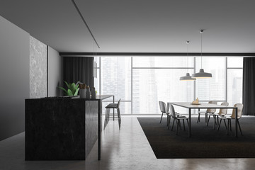 Gray panoramic kitchen and dining room