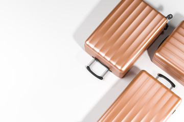 Top view of beige suitcases