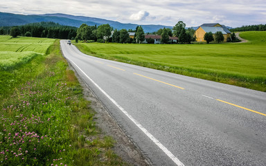 Asphalt road in the mountains of Norway.