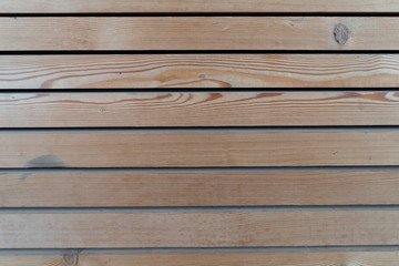 Obraz premium Surface of a transparent painted planking of a facade of horizontal wooden slats