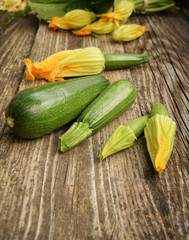 zucchini lie on a wooden table, organic food, healthy nutrition