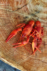 Crawfish cooked and served on wooden background