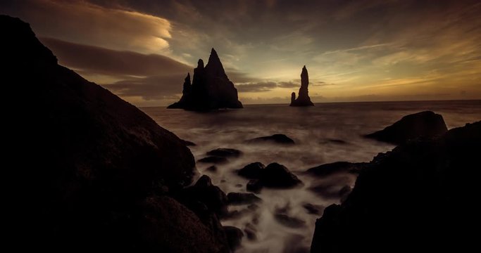 Rock formations at sunset, Vik Beach, Timelapse