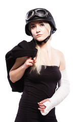girl with a broken arm in plaster, wearing motorcycle helmet