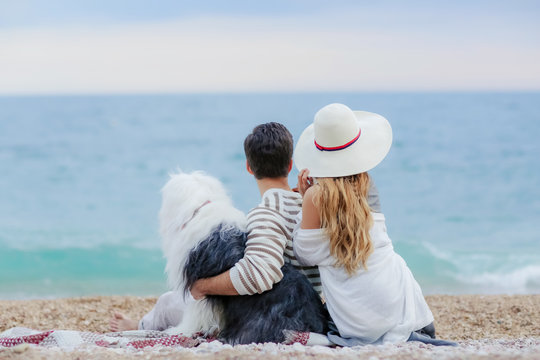 happy couple on the beach. Sea view with yellow boud