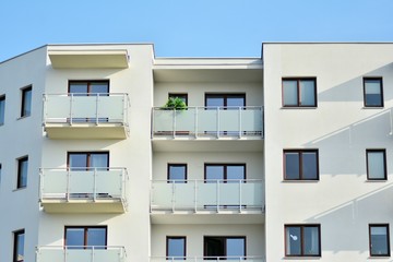 Modern apartment buildings on a sunny day with a blue sky. Facade of a modern apartment building