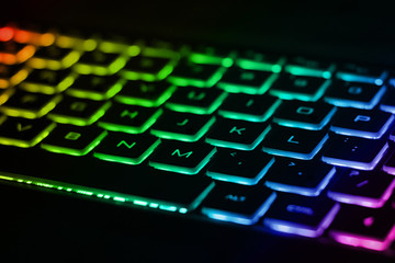 Beautiful colorful modern keyboard with rainbow backlight. Backlight of the keyboard in different colors