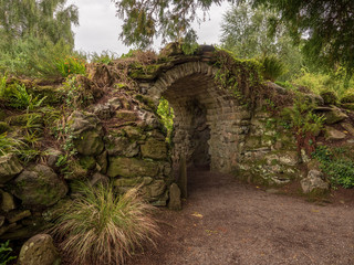 old stone archway in the park