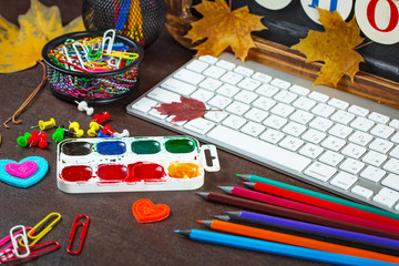 Back to school. Items for school classes in the composition on the table.