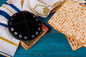 Close up of concept jewish holiday passover matzot and tallit the substitute for bread on the...