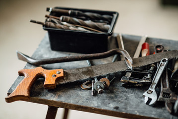 old work tool is on the table , small workroom with architecture dummy manufacturing
