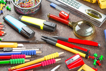 Naklejka premium Back to school. Items for school classes in the composition on the table.