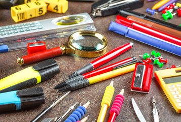 Back to school. Items for school classes in the composition on the table.