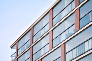 Modern apartment buildings on a sunny day with a blue sky. Facade of a modern apartment building